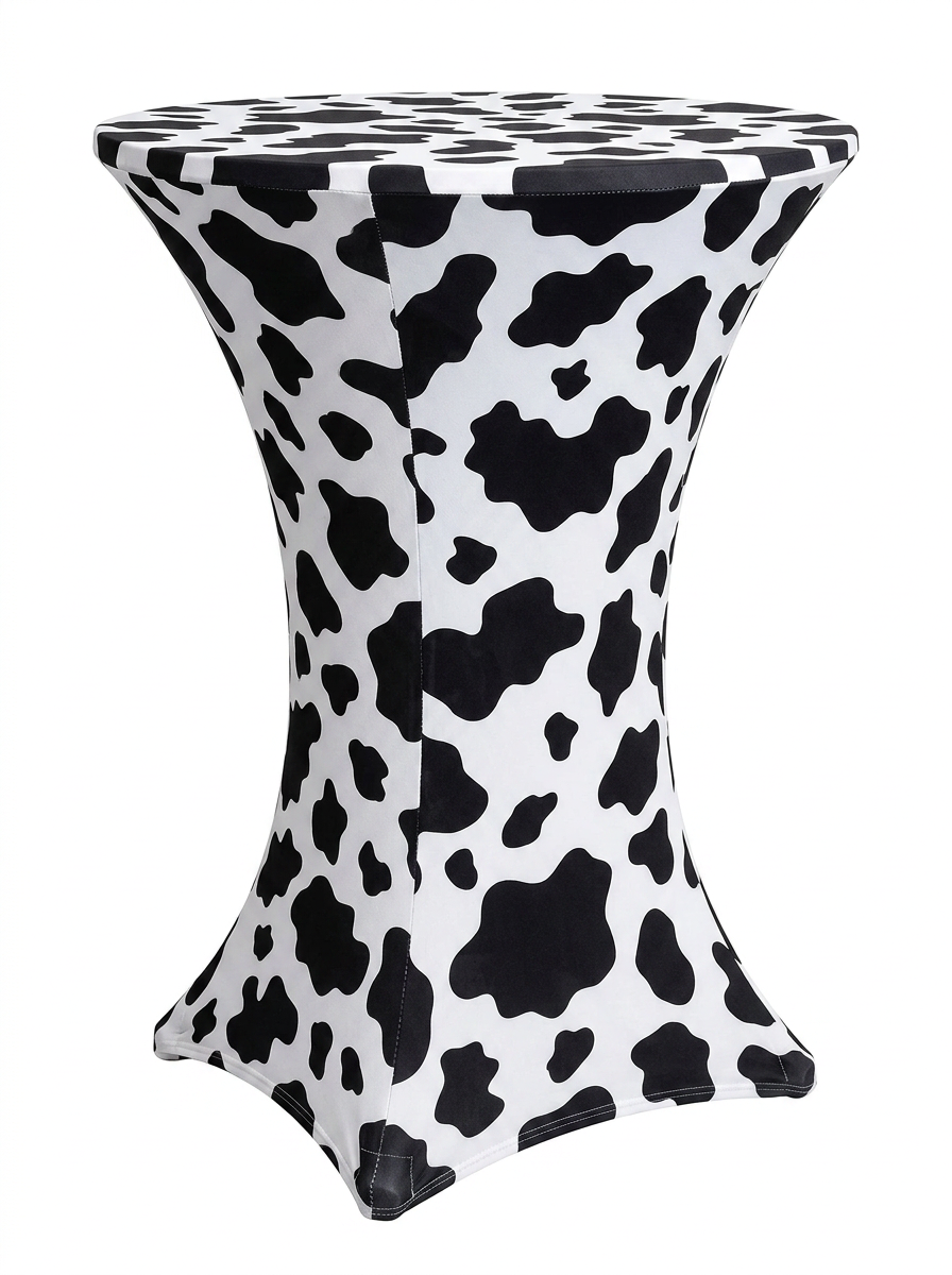 Cow print spandex cocktail table cover rental on a cocktail table in Hamilton